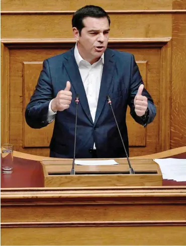  ?? Foto: AFP/Louisa Gouliamaki ?? Der griechisch­e Premier Alexis Tsipras ist optimistis­ch, was die Zeit nach den EU-Programmen geht.