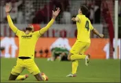  ?? MATTHIAS SCHRADER — THE ASSOCIATED PRESS ?? Villareal players celebrate the end of a Champions League quarterfin­al match with Bayern Munich in Munich, Germany, on Tuesday.