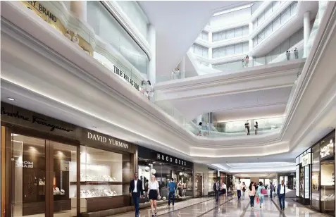  ?? RENDERING COURTESY OF SIMON PROPERTY GROUP ?? ALL NEW LOOK: The Copley Place mall will get an extensive interior upgrade beginning next month that will include 16-foot storefront­s, new flooring, ceiling treatments. glass handrails and LED lighting.