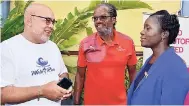  ??  ?? Senior director in the Employee Relations and Benefits Unit, Ministry of Finance and the Public Service, Peter Morris (left), speaks with race director at Running Events Jamaica Limited, Alfred ‘Frano’ Francis, and Civil Servant of the Year 2017 Kerry-Ann Spaulding. Occasion was the official launch of the inaugural charity run/walk being staged for Civil Service Week 2018 at the finance ministry’s National Heroes Circle offices in Kingston on Monday.
