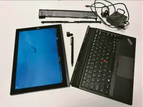  ??  ?? Mix it up: the thinkPad X1 tablet comes with lots of attachment­s and can get cumbersome. — Ann MARIE CHAnDy/ the star