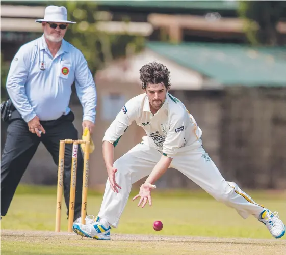  ?? Picture: JERAD WILLIAMS ?? Queens' Matt Brown grabbed four wickets and produced a steady knock to guide his side home.