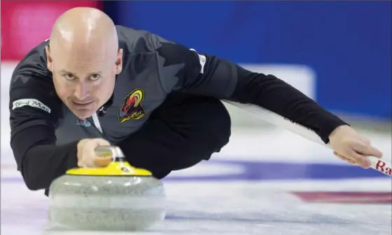  ?? ADRIAN WYLD, THE CANADIAN PRESS ?? Skip Kevin Koe of Calgary throws a rock during the Canadian Olympic curling trials against team Jacobs in Ottawa on Sunday. Koe’s rink won in extra ends, 8-6.