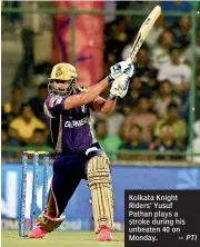  ??  ?? Kolkata Knight Riders’ Yusuf Pathan plays a stroke during his unbeaten 40 on Monday. — PTI