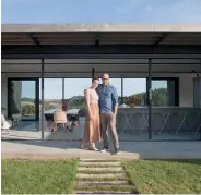  ??  ?? Before they appeared on and won TV reality show The Block, Corban and Alex Walls had made a home at Muriwai using shipping containers. Photo / Michelle Hyslop.