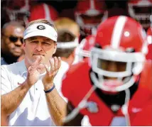  ?? CURTIS COMPTON/CCOMPTON@AJC.COM ?? Georgia coach Kirby Smart will have plenty to cheer about as his team goes through the 2018 regular season undefeated, surviving trips to South Carolina and LSU.