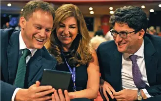 ??  ?? Top brass: Lord Feldman, right, with Grant Shapps and Tory peer Karren Brady