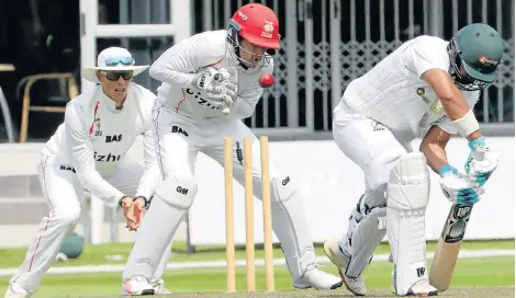  ?? Picture: FREDLIN ADRIAAN ?? WELL CASTLED: Warriors batsman Gihahn Cloete is bowled by spinner Aaron Phangiso for a well-played 81, as Highveld Lions’ wicket-keeper Nicky van den Bergh and slip Rassie van der Dussen keep a close watch during their 4-Day Franchise Series match at St George’s Park on Monday