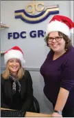  ??  ?? Beaming festive smiles from Ann Kelleher and Aileen Murphy at FDC Group.