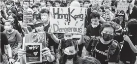  ?? Anthony Kwan / Getty Images ?? A protest at Hong Kong’s airport caused the cancellati­on of over 150 flights and was a rare case of the recent movement having a direct effect on business travel.