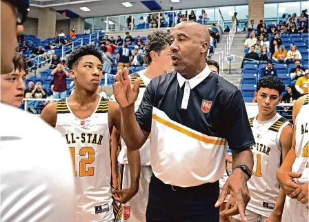  ?? Photos by Ronald Cortes/contributo­r ?? Team Gold coach Bruce Bowen gives his team instructio­ns during the San Antonio Sports All-star Game on Sunday at Northside Gym. Team Gold lost to Team Black. Bruce Bowen also coached his son, Ojani, at TMI.