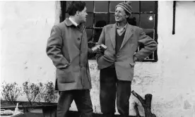 ?? Photograph: Leeds University Library/PA ?? Stanley Ellis, left, one of the fieldworke­rs of the 1950s Survey of English dialects, records Tom Mason in North Yorkshire.