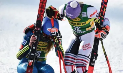  ?? Photograph: Michel Cottin/Agence Zoom/Getty Images ?? Mikaela Shiffrin (left) is comforted by Tessa Worley after Monday’s victory.