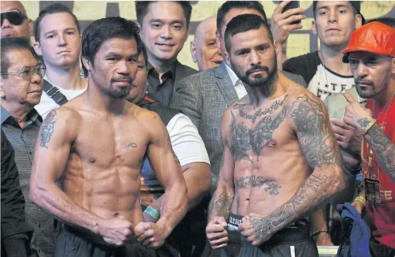  ??  ?? Manny Pacquiao, left, and Lucas Matthysse pose during the weigh-in ahead of today’s fight.