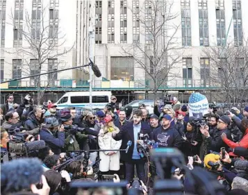  ?? BRYAN WOOLSTON AP ?? Gavin Wax, leader of the New York Young Republican­s, addresses the press during a rally Monday in front of the New York Criminal Court building in Manhattan in support of former President Donald Trump.