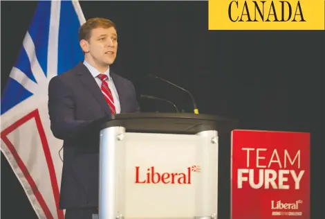  ?? PAUL DALY / THE CANADIAN PRESS ?? Liberal Leader Andrew Furey, reelected as premier of Newfoundla­nd and Labrador, speaks to the media in St. John's on Saturday.