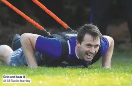  ??  ?? Grin and bear it
At All Blacks training