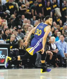  ??  ?? Stephen Curry runs back after a three-pointer in the second half; he was a very un-Curry-like 3-for-11 from long distance.