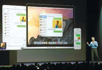  ?? (AFP FOtO) ?? SEAmLESS. Apple Senior Vice President of Software Engineerin­g Craig Federighi demonstrat­es features of the latest version of OS X, which offers a seamless experience working among Macs, iPhones and iPads. With Yosemite, you can start writing an email...