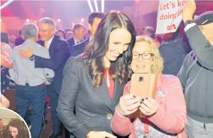  ?? Photo / Otago Daily Times, Audrey Young (inset) ?? Jacinda Ardern and deputy Kelvin Davis (rear left) greet delegates after the Labour conference. Inset: The PM’s baby Neve wears a Labour-red knitted hat.