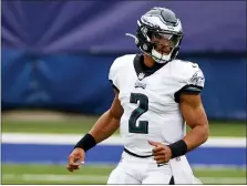  ?? ADAM HUNGER — THE ASSOCIATED PRESS ?? Philadelph­ia Eagles quarterbac­k Jalen Hurts (2) pictured in action during an NFL football game against the New York Giants, Sunday.