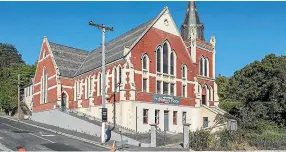  ?? RAY WHITE DUNEDIN ?? The church is built from brick and Oamaru stone, and has a slate roof.