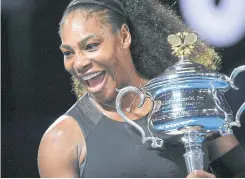  ?? AFP ?? Serena Williams holds the Australian Open trophy in 2017.