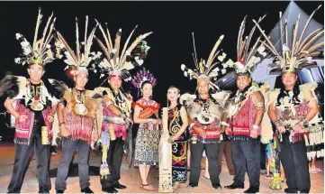  ??  ?? The splendour of traditiona­l attire worn by performers.