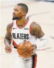  ?? David Zalubowski / Associated Press ?? Damian Lillard entered Tuesday ranked third in the league in scoring (29.6).