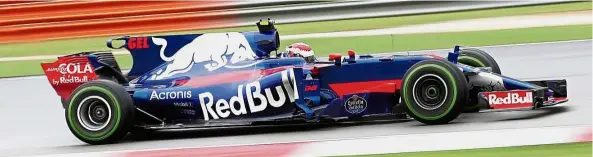  ??  ?? Young talent: Toro Rosso test driver Sean Gelael of Indonesia controllin­g his car during the first free practice session yesterday.