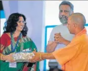  ??  ?? Tulika receiving the award from Chief Minister Yogi Adityanath