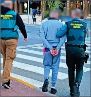  ?? ?? DETAINED: Officers take Irishman into custody