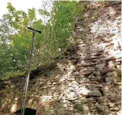  ??  ?? Recording Laura used a bat microphone set-up at Corra Castle during a survey (Pic by Laura Preston)