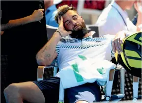  ?? GETTY IMAGES ?? It all got too much for Benoit Paire who decided to have a quick snooze during his match against Cameron Norrie.