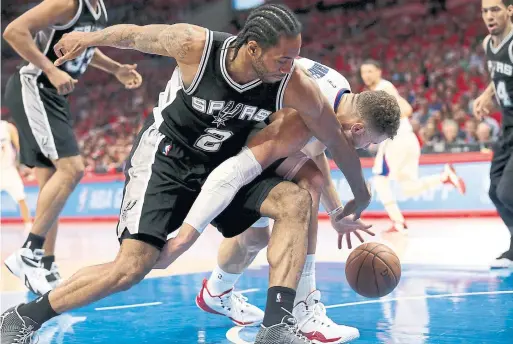  ?? STEPHEN DUNN/GETTY IMAGES FILE PHOTO ?? The Raptors have never had a defensive force quite like ex-Spur Kawhi Leonard to build around — until now. His arrival gives the new coaching staff enviable options.