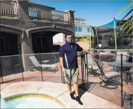  ?? Chase Stevens ?? Las Vegas Review-journal @csstevensp­hoto Brandon Hulet talks about issues with a neighbor who keeps bees in his neighborho­od. Hulet’s 6-year-old son has been stung by bees multiple times in the family’s backyard.