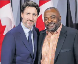  ??  ?? Chris Campbell (right), equity and diversity representa­tive of the Carpenters’ District Council of Ontario, is photograph­ed with Justin Trudeau, prime minister of Canada.