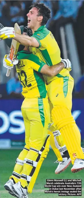  ?? ?? Glenn Maxwell (L) and Mitchell Marsh celebrate Australia’s T20 World Cup win over New Zealand in Dubai last November after Marsh’s heroic innings sealed the victory. Picture: AFP