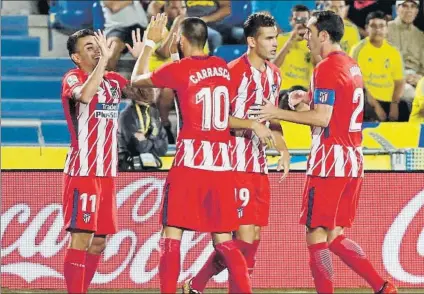  ?? FOTO: EFE ?? Correa y Carrasco, los autores de los dos primeros goles del Atlético de Madrid ante la UD Las Palmas