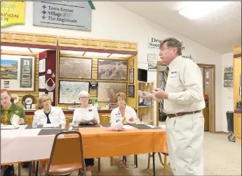  ?? (NWA Democrat-Gazette/Rachel Dickerson) ?? Dale Phillips (right) speaks to the Butterfiel­d Trails Chapter of the Questers on Sept. 26 about Cherokee history around the time of the Trail of Tears.