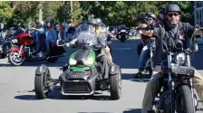  ?? MARY SCHWALM / BOSTON HERALD ?? PERFECT FOR RIDING: Motorcycle­s and trikes stream into a parking lot for the festival at the conclusion of the 10th annual Wounded Vet Run ride in Malden on Sunday, a nice day for a ride.