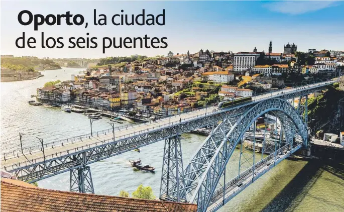  ??  ?? El famoso puente de Don Luis I conserva un enorme arco metálico que lo soporta y ofrece unas vistas impresiona­ntes sobre la ciudad portuguesa.