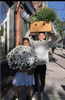  ??  ?? Mulherin with her son Jasper outside her gallery at 1080 Queen Street West in 2016