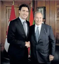  ?? THE CANADIAN PRESS FILES ?? Prime Minister Justin Trudeau meets with the Aga Khan on Parliament Hill in Ottawa on May 17, 2016. Opposition parties are calling on Trudeau to reimburse taxpayers for the costs of his family’s trip to the Aga Khan’s private island.