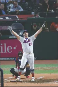  ?? The Associated Press ?? MONEY BALL: Pete Alonso, of the New York Mets, celebrates winning the Major League Baseball Home Run Derby, in Cleveland.