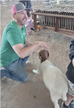  ?? (Photos: Colorado State University Extension). ?? LEFT: A Boulder County 4-H adult leader is shown with a member’s goat project entry for the Boulder County Fair. RIGHT: Leaders provide opportunit­ies for youth to build skills in something that sparks their interest.