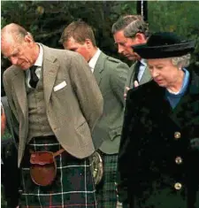  ?? PHOTO: CHRIS BACON/AP ?? Prince Phillip, Peter Phillips, Prince Charles and Queen Elizabeth II stop to gaze at the flowers and cards of condolence laid at the gates of Balmoral, five days after Diana’s death.