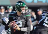  ?? Bill Kostroun / Associated Press ?? New York Jets quarterbac­k Zach Wilson passes against the Eagles on Sunday in East Rutherford, N.J.