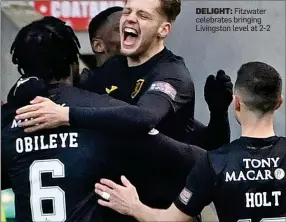  ?? ?? DELIGHT: Fitzwater celebrates bringing Livingston level at 2-2