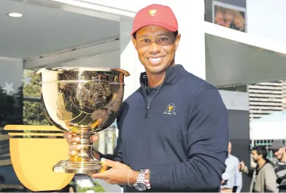  ?? Picture: Getty Images ?? TWO ROLES. US Presidents Cup captain Tiger Woods would like to also play in the event.